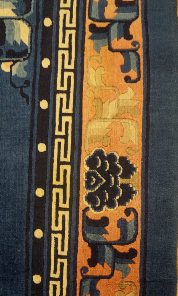 Intricate blue and orange floral design