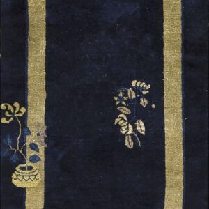 Deep blue Peking hallway runner rug with broad gold borders and decorative motifs.