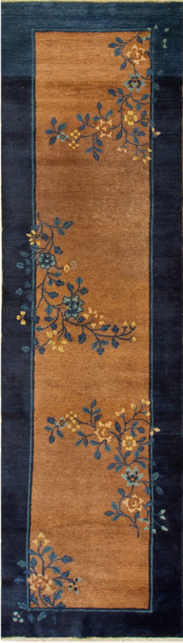 Brown runner rug with a dark blue border and stylized yellow and blue floral designs.