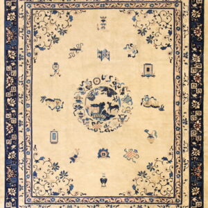 Beige rug with dark blue borders and a central round pictorial design surrounded by symbolic accents.