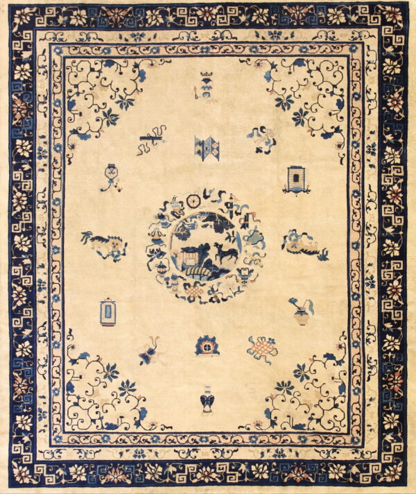 Beige rug with dark blue borders and a central round pictorial design surrounded by symbolic accents.