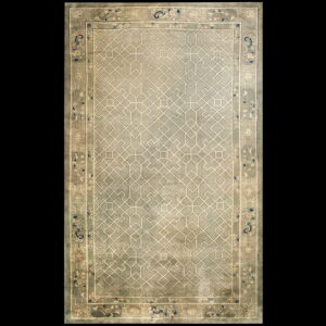 Sage green rug featuring an overall cream geometric trellis pattern and a detailed floral border.
