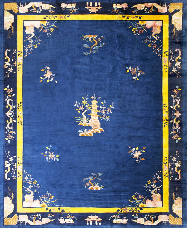 Plush cobalt blue rug featuring a central landscape pattern and surrounded by a striking yellow border.