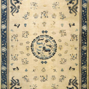 Cream field rug featuring stylized navy blue corner dragons, scattered symbols, and a wide floral border.