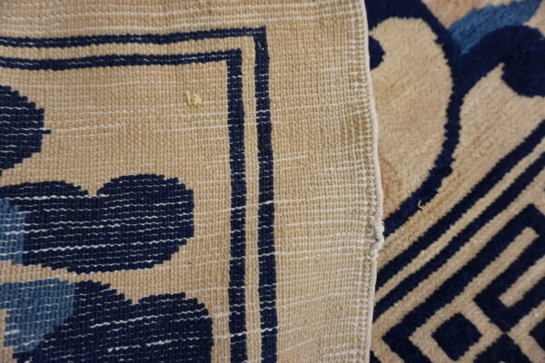 Close-up of intricate textile pattern.