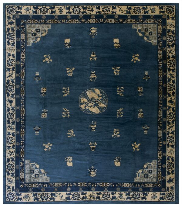 A deep blue rug featuring a central medallion, scattered tan designs, and complex ornamental borders.