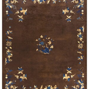 Dark brown rug featuring detailed floral and bird motifs in blue and gold around the border and center.