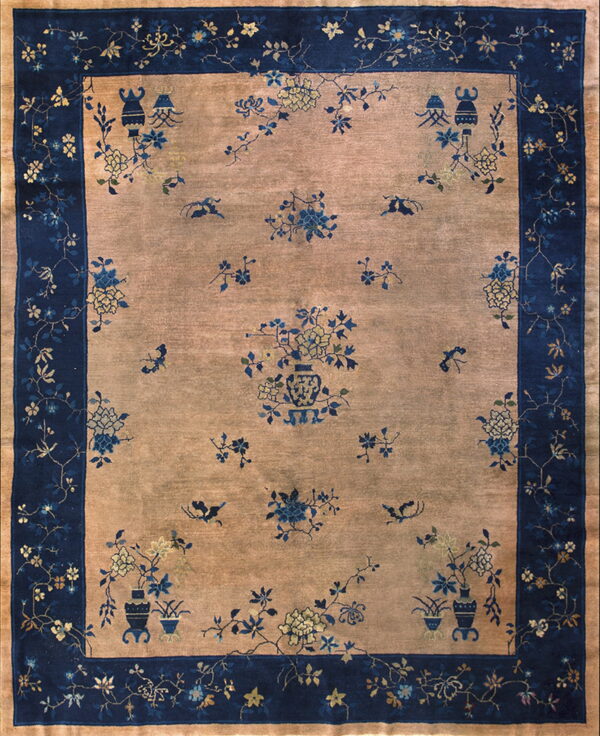 Antique chinese - peking room size wool gray rug 1 Rectangular rug with a tan field and navy border, patterned with ornate blue and pale yellow florals.