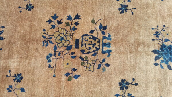 Antique chinese - peking room size wool gray rug 3 Tan pile rug detailed with scattered floral and vine designs in blue, gold, and subtle green.