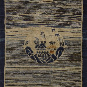 High-texture striped runner rug in navy and khaki featuring a central circular scenic motif.