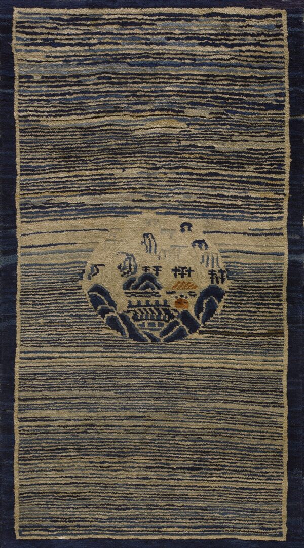 High-texture striped runner rug in navy and khaki featuring a central circular scenic motif.