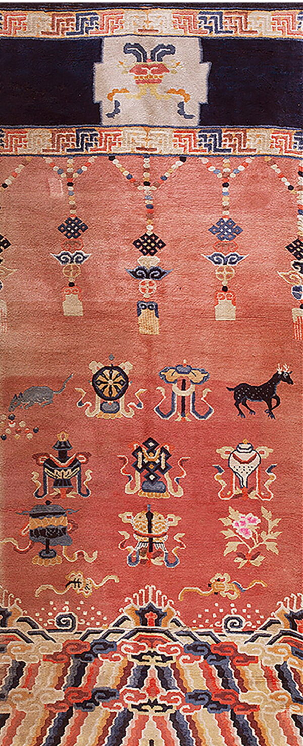 Dusty rose runner rug panel displays intricate symbolic designs, colorful borders, and stylized animal and cloud motifs.