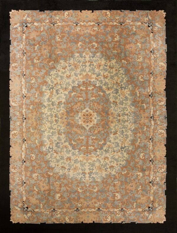 Ornate traditional rug in rust, cream, and slate blue with a central floral medallion on a black background.