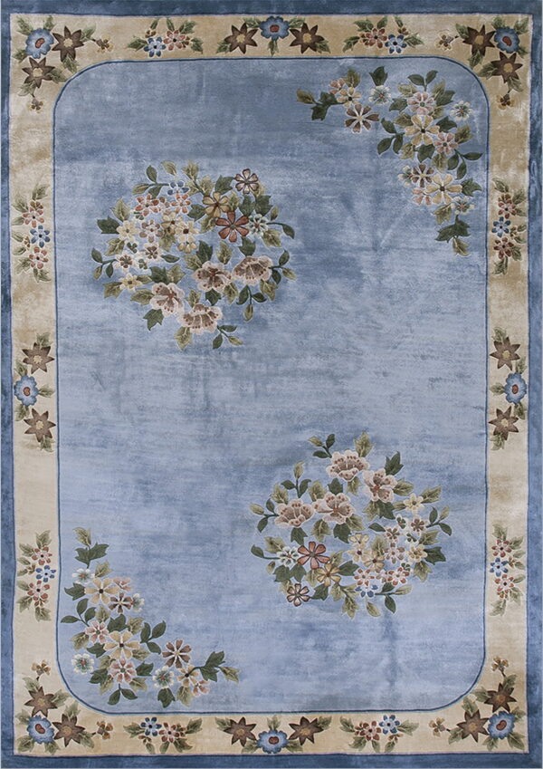 Blue floral area rug featuring large center bouquets and a rounded beige border with repeating flowers.