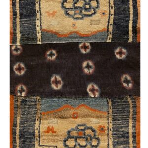 Joined rug panels featuring stepped navy borders, tan centers with floral medallions, and a dark brown patterned stripe.