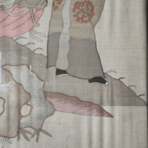 Detailed textile showing gray robes, black shoes, pink garments, and abstract rust patterns on an off-white background.
