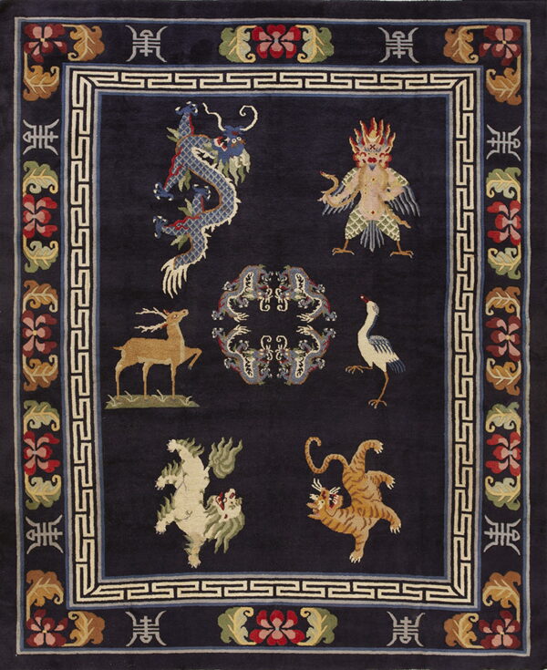 Dark navy rug with a central panel of dragons, animals, and mythical figures inside a meander border.