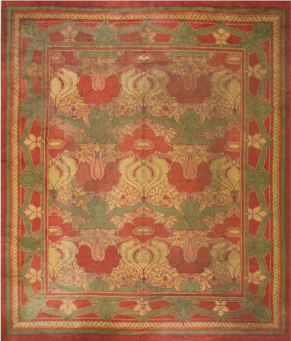 Red rug with repeating olive green and gold stylized floral designs and wide patterned borders.