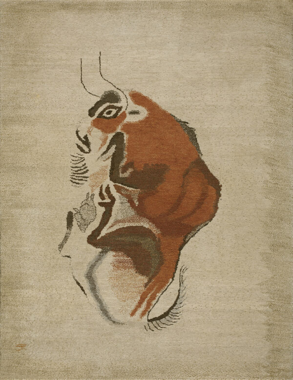 Expressive vintage ecuadorian pictorial art rug from ecuador 1 Low-pile beige rug displaying a stylized profile of an animal face patterned in rust, brown, and black.