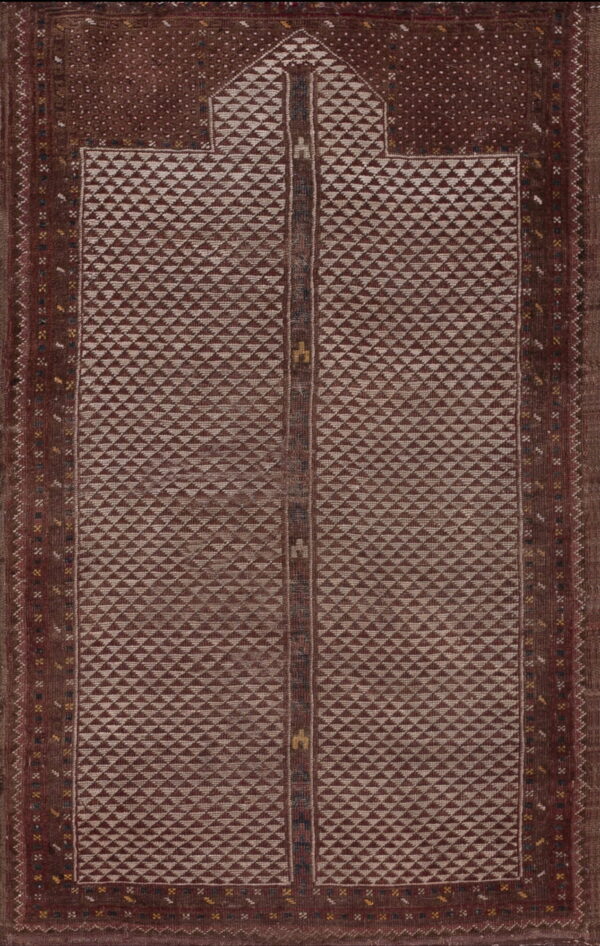 Geometric maroon and tan rug featuring an arched top and a central field of repeating diamond motifs.
