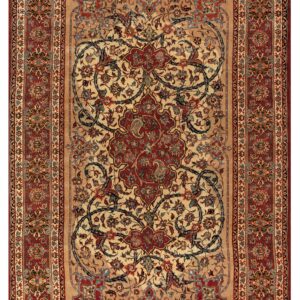 Detailed traditional rug with a cream field, red border, and dark floral and vine motifs.