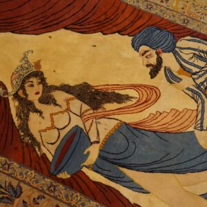 Low-pile rug detail showing figures in blue and white on a yellow field framed by deep red curtains.