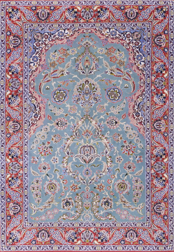 Blue traditional rug with intricate floral designs, a central medallion arch, and detailed red borders.