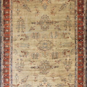 Traditional short-pile rug with a pale sage field and bold, ornate borders in rust orange and navy blue.