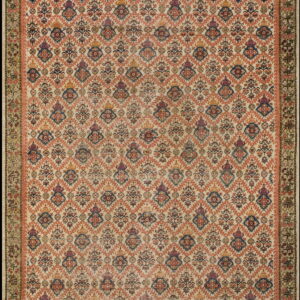 Faded cream rug with an intricate repeating floral diamond pattern in rust, blue, and purple colors.
