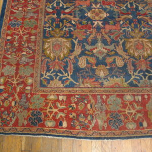 Colorful floral patterned antique rug