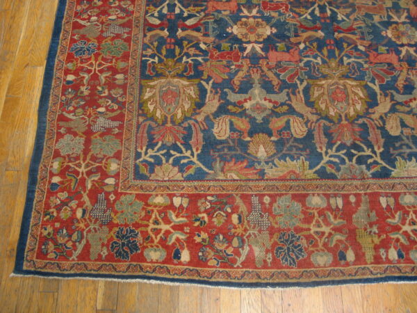 Colorful floral patterned antique rug