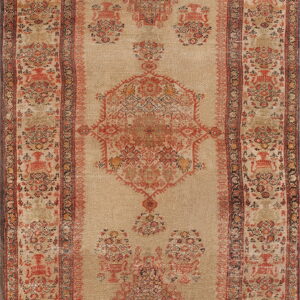 Low-pile runner rug in faded tan and rust, featuring a stylized central medallion and multiple ornate borders.