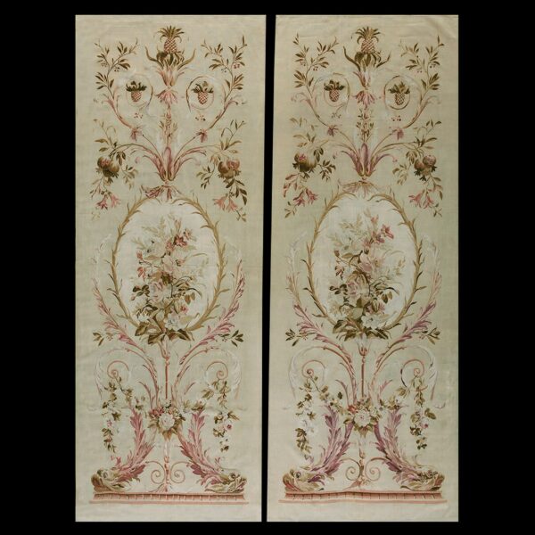 Pair of vertical pale cream rug panels featuring elaborate pink and brown symmetrical floral and botanical designs.