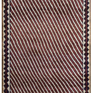 Textured rug with alternating diagonal stripes in deep red and off-white, surrounded by a navy triangle border.