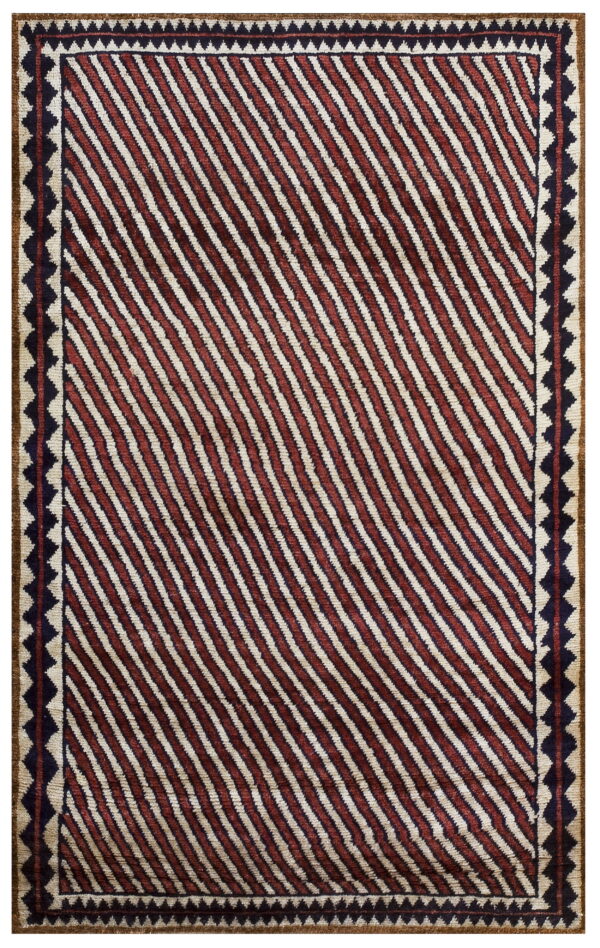 Textured rug with alternating diagonal stripes in deep red and off-white, surrounded by a navy triangle border.