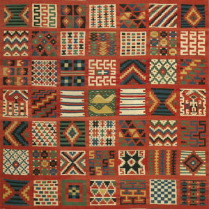 Multicolored flatweave rug with a red grid containing squares of diverse geometric and stylized patterns.