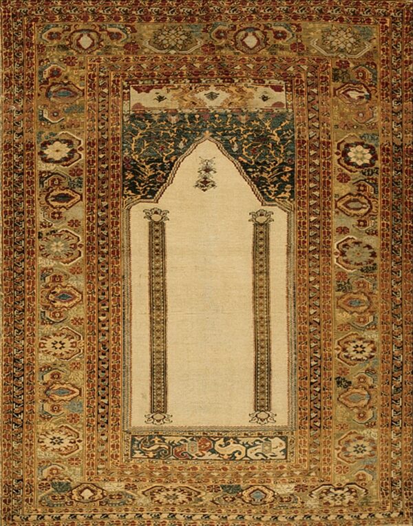 Rug featuring a cream niche and wide borders with stylized medallions in rust, teal, and gold.