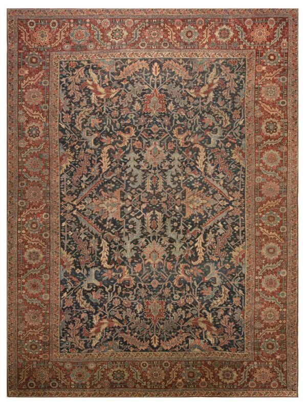 Rectangular rug with a dark blue field, intricate traditional patterns, and muted red and teal borders.