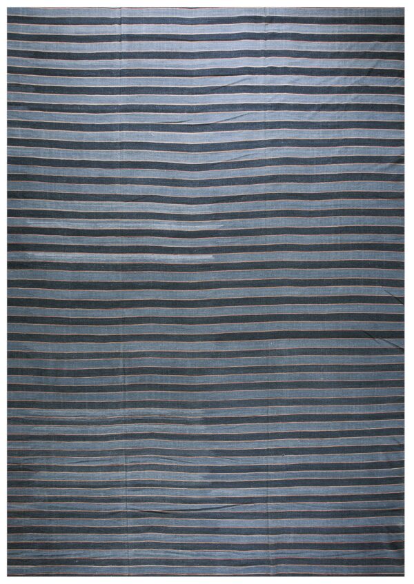 Flatweave rug with alternating dark blue and light gray horizontal stripes defined by thin reddish accent lines.
