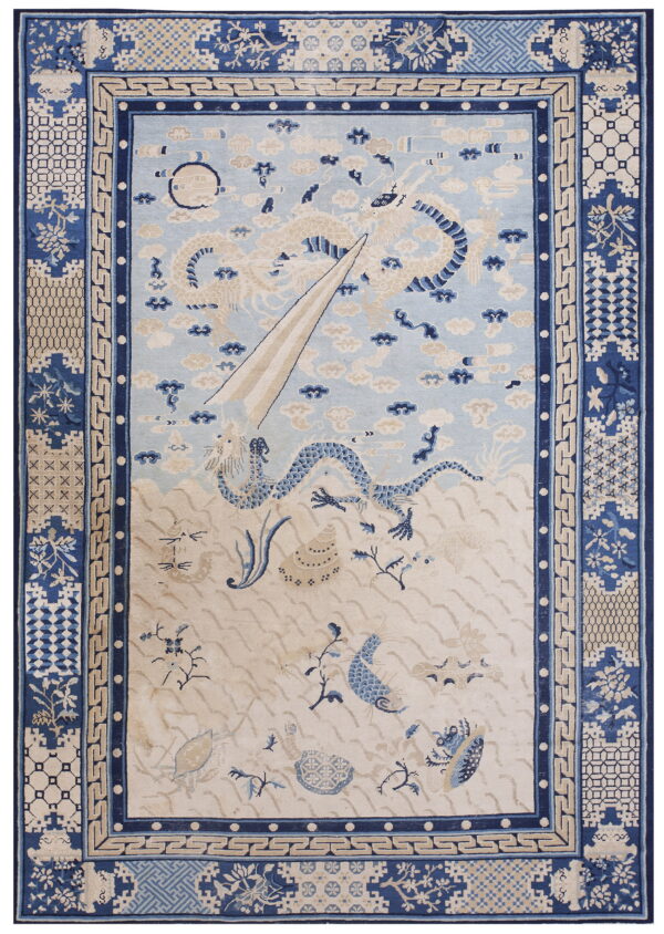 Blue and cream rug depicting a dragon rising from waves into a sky filled with clouds.