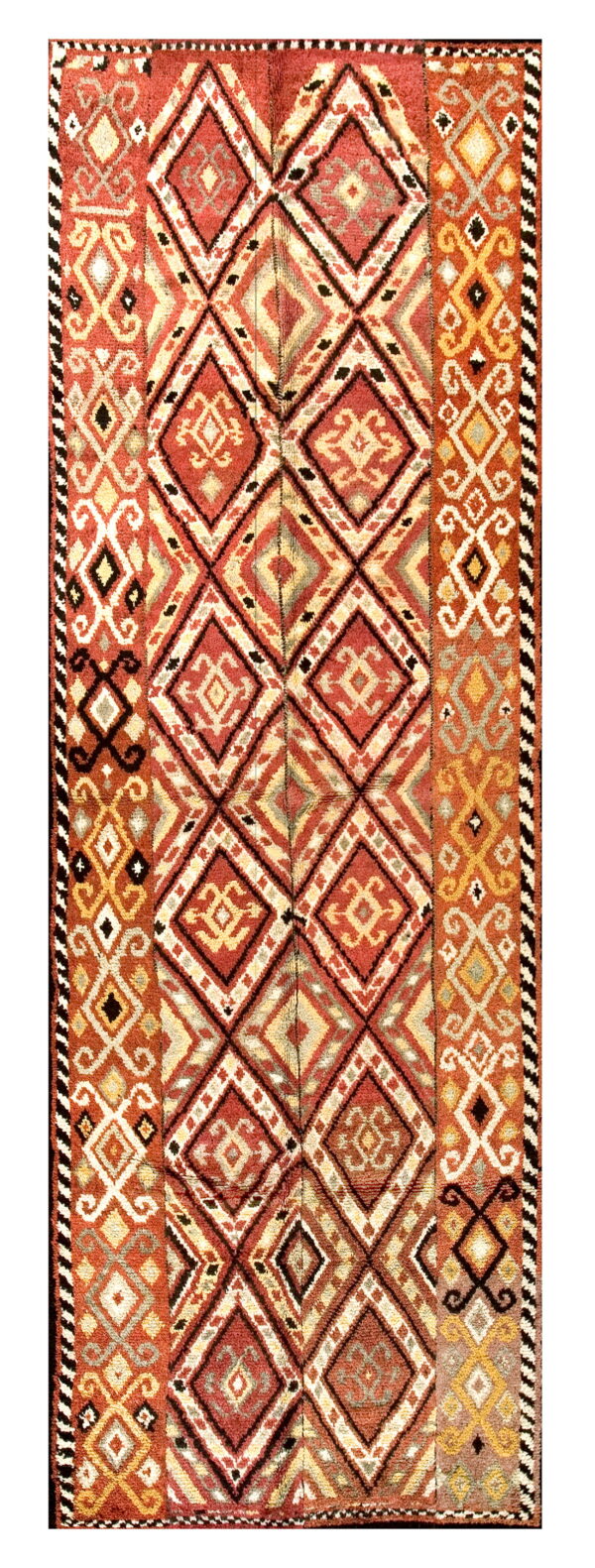 Textured runner rug featuring large red-orange diamonds and geometric borders in cream, yellow, and black.