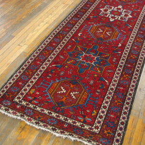 Antique-style Karajeh hallway runner with geometric tribal patterns