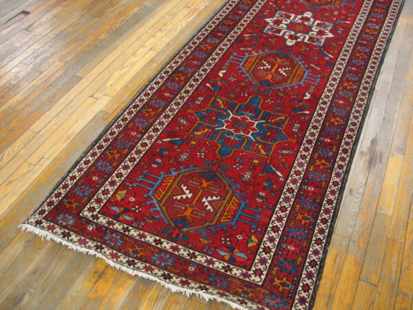 Antique-style karajeh hallway runner with geometric tribal patterns