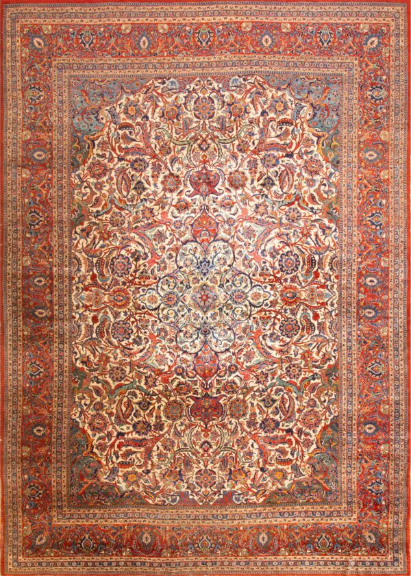 Light ivory color finely woven antique floral persian kashan rug