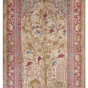 Antique-style rug with a central tree of life design featuring faces and animals on a cream field, bordered by raspberry and tan patterns.