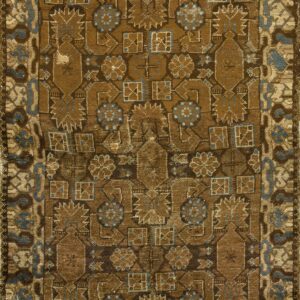 Earth-toned rug with a dense geometric pattern in shades of brown accented by dusty blue.
