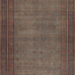 Rectangular distressed rug in muted blue and red tones with an ornate floral border.