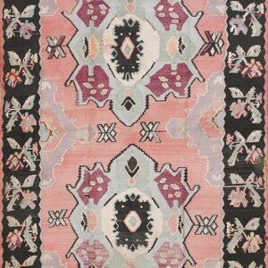 Pink flatweave rug with stacked geometric medallions and a wide black border of stylized floral designs.