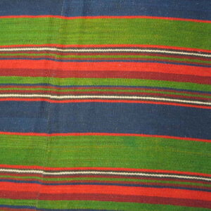 Boldly striped flat-weave textile in wide bands of blue, green, red, burgundy, and thin white lines.