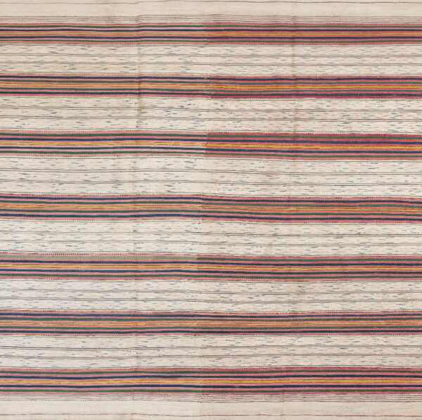 Flatweave rug with horizontal stripes of cream, navy blue, rose, green, and yellow.